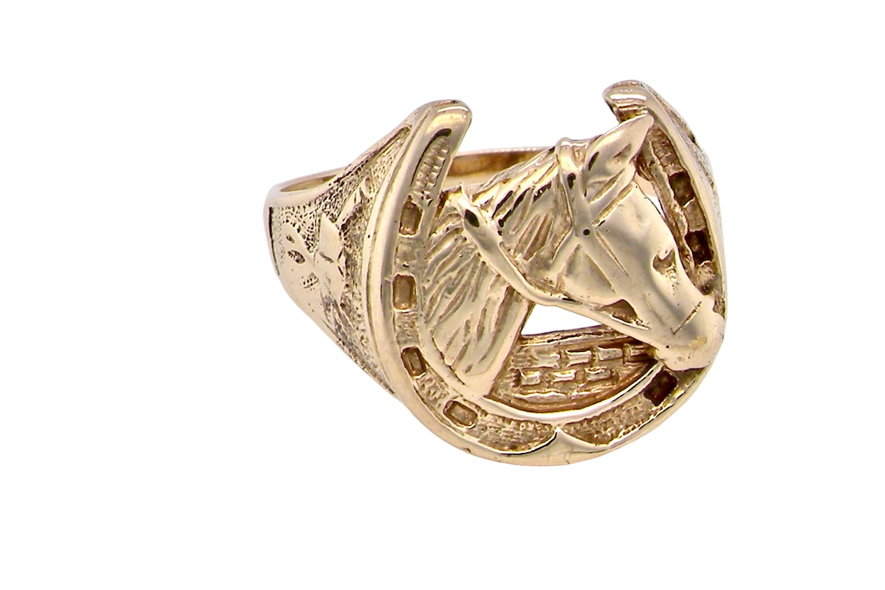 A gold horseshoe ring