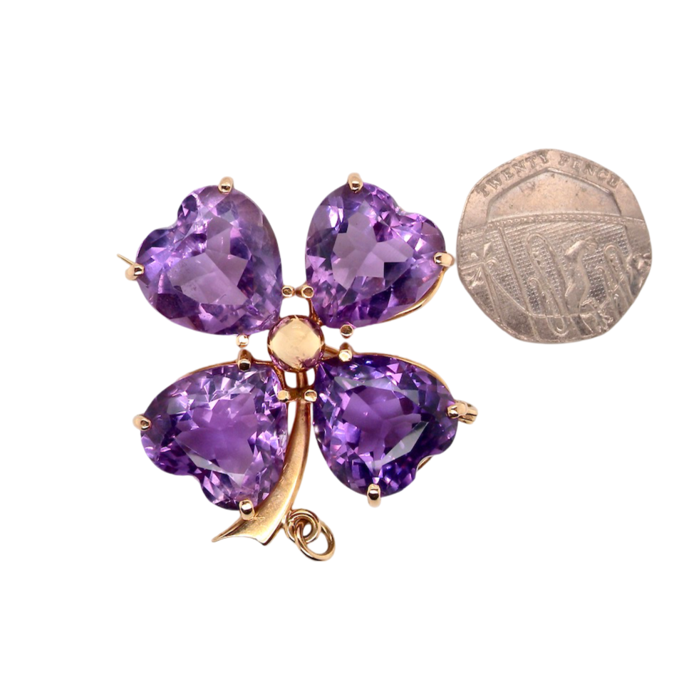An amethyst brooch