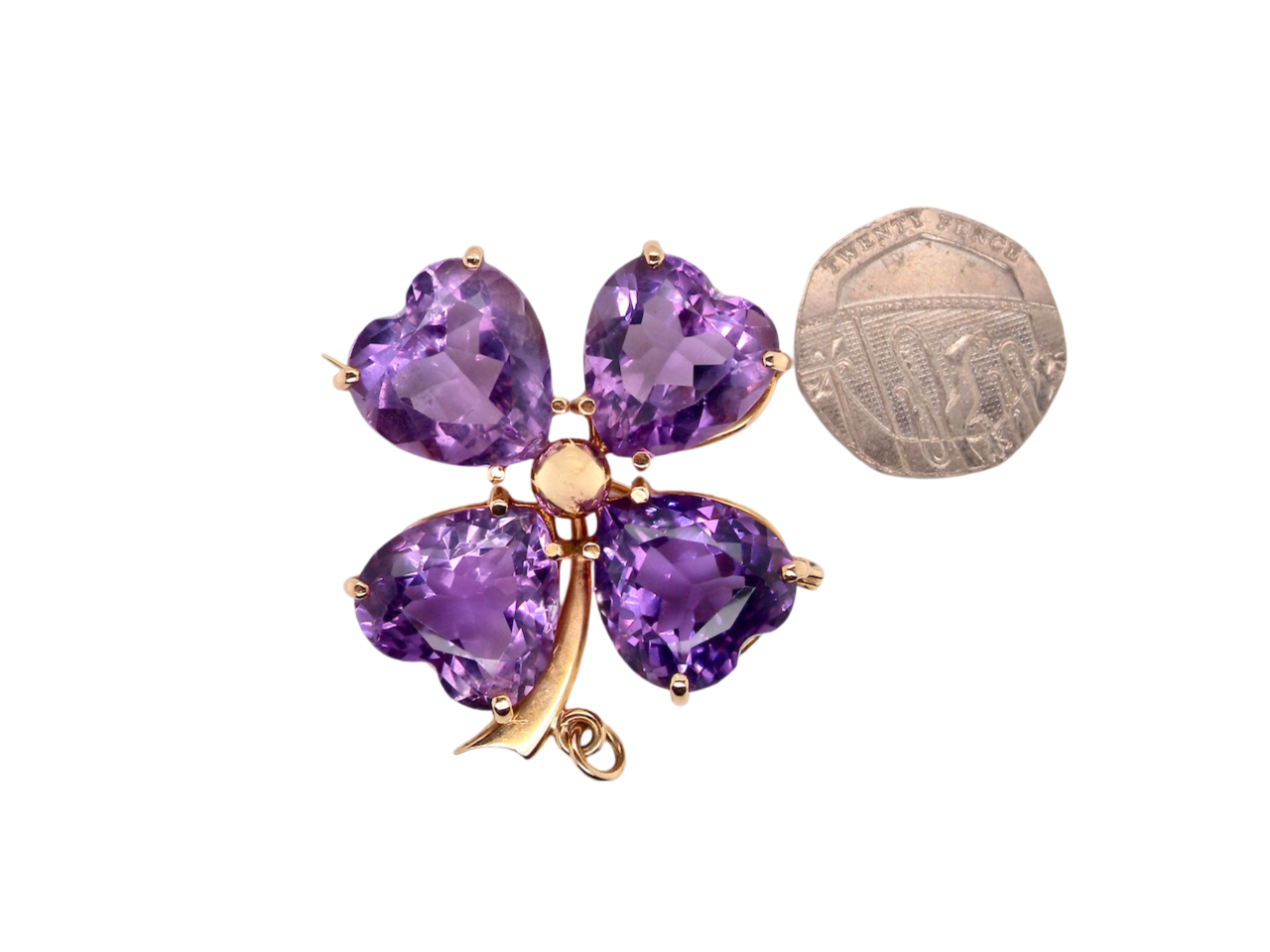An amethyst brooch