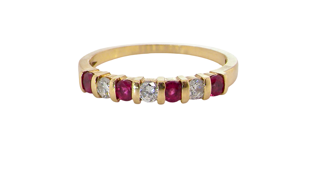 A half hoop 18 carat yellow gold eternity ring. Set with four bright red rubies, each 2.6mm (total carat weight 0.28 est)