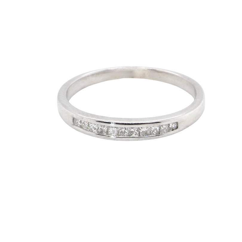 A half hoop 9 carat white gold eternity ring.
Channel set with 11 Princess cut white diamonds,