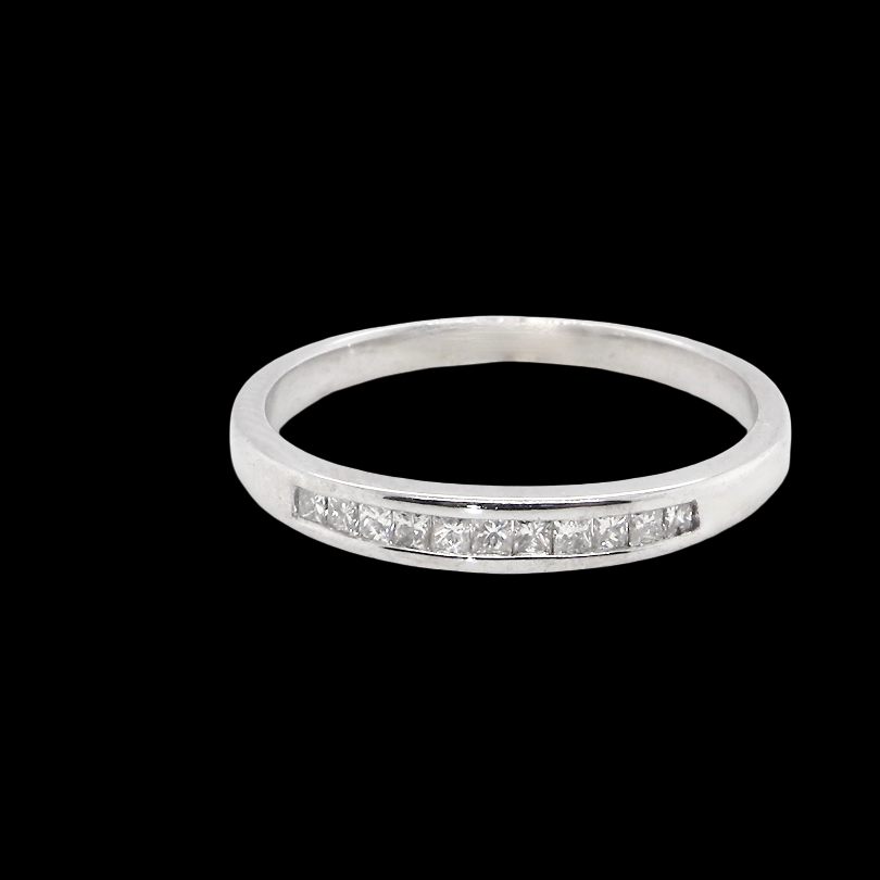 A half hoop 9 carat white gold eternity ring.
Channel set with Princess cut white diamonds,
