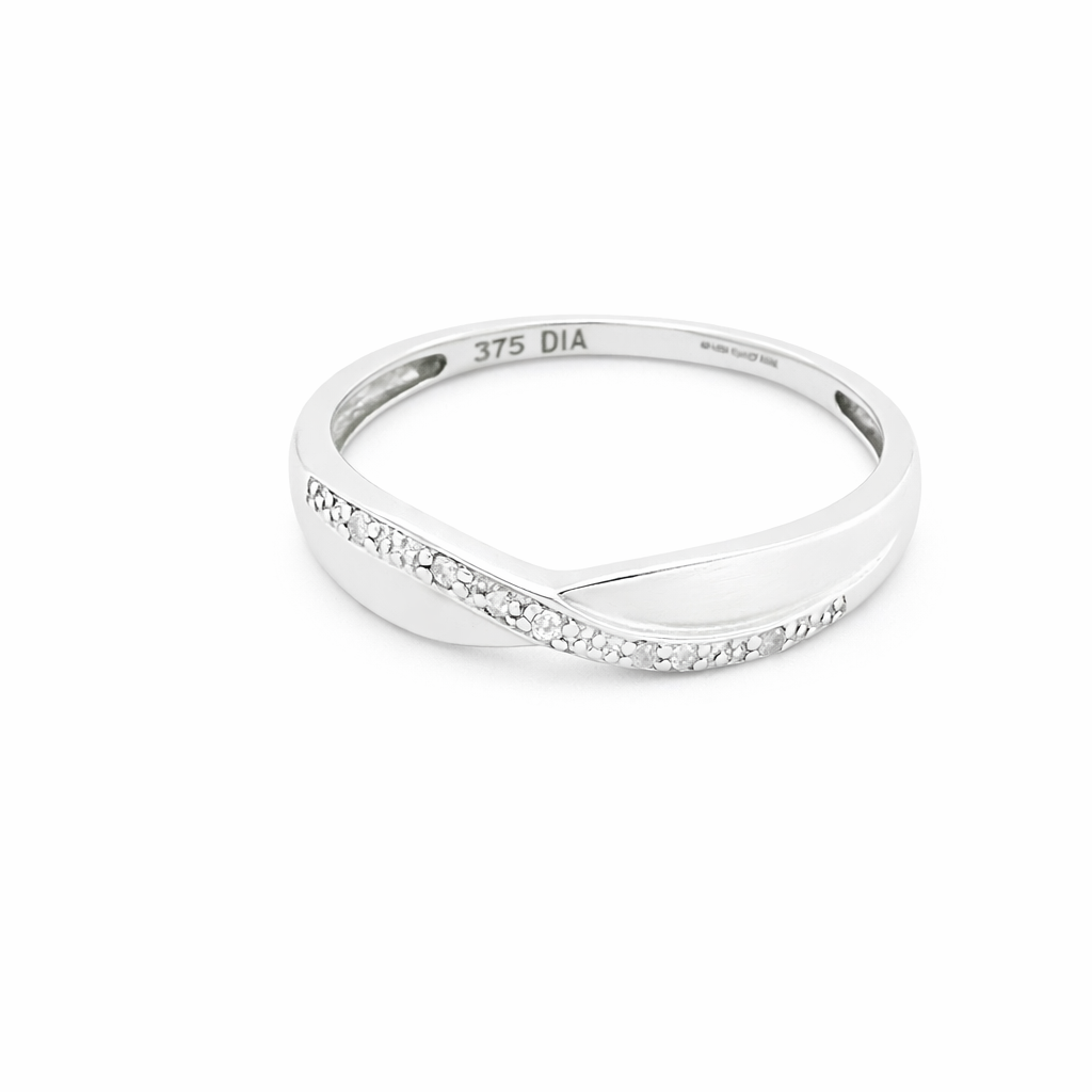 A half hoop 9 carat white gold eternity ring. Set with five small white diamonds, each 1.3mm (total 0.05 carats)