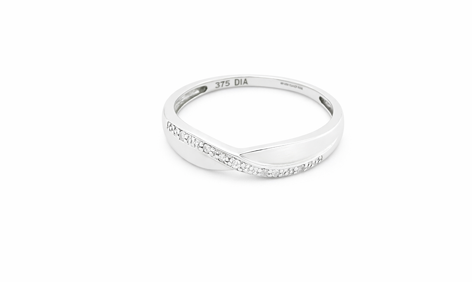 A half hoop 9 carat white gold eternity ring. Set with five small white diamonds, each 1.3mm (total 0.05 carats)