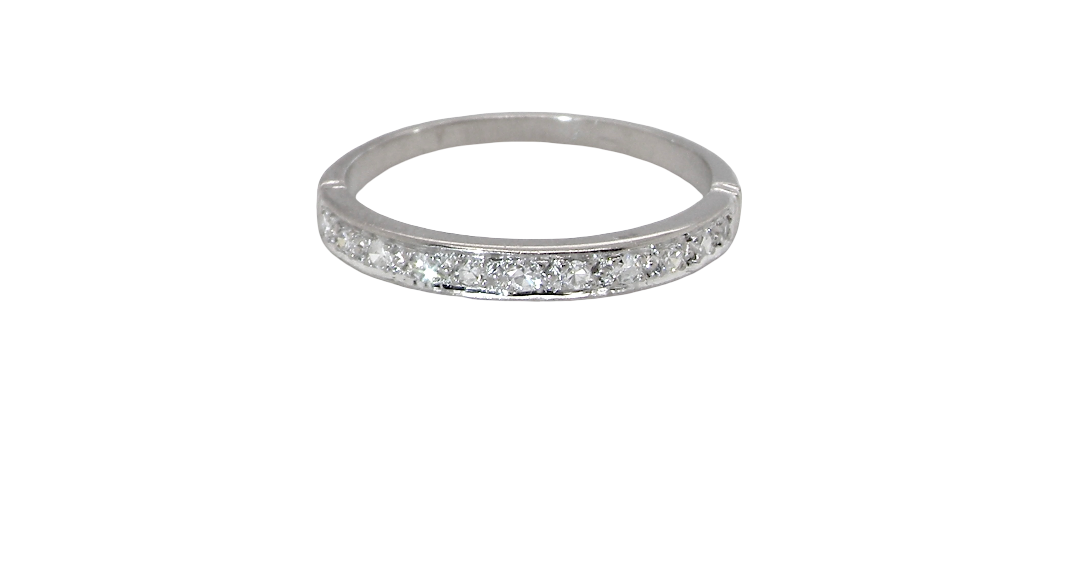 A half hoop eternity ring. Set with eleven small white diamonds, brilliant cut 2mm each (total est 0.33 carats) colour i-k, clarity Si.
