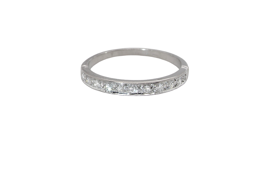 A half hoop eternity ring. Set with eleven small white diamonds, brilliant cut 2mm each (total est 0.33 carats) colour i-k, clarity Si.
