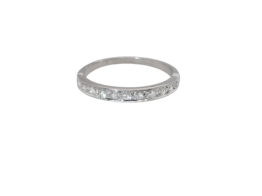 A half hoop eternity ring. Set with eleven small white diamonds, brilliant cut 2mm each (total est 0.33 carats) colour i-k, clarity Si.