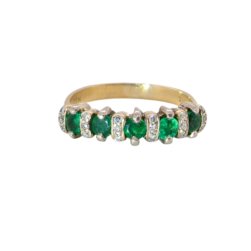 A half hoop ring, stamped 750 (testing as 18 carat gold)
Set with alternate gemstones, five bright green emeralds