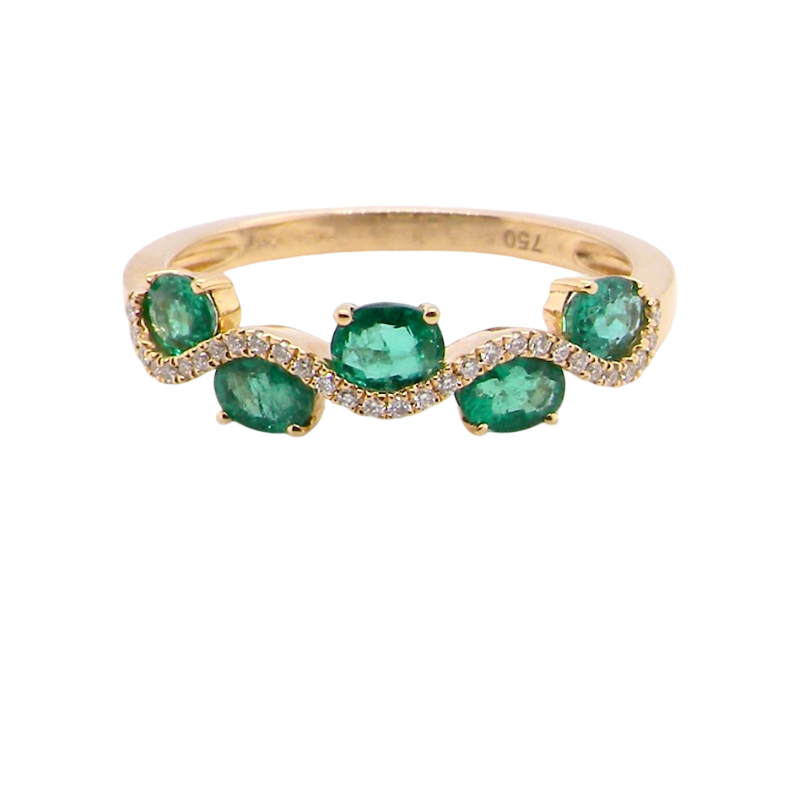 A half hoop ring with a very attractive line of oval cut emeralds, each 4x3mm, a lovely deep grass green hue, and with very good clarity too.