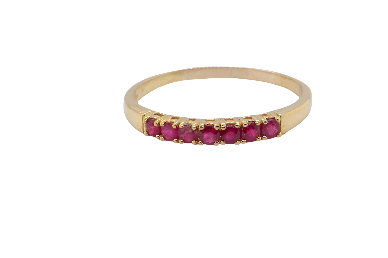 A half hoop ruby eternity ring
