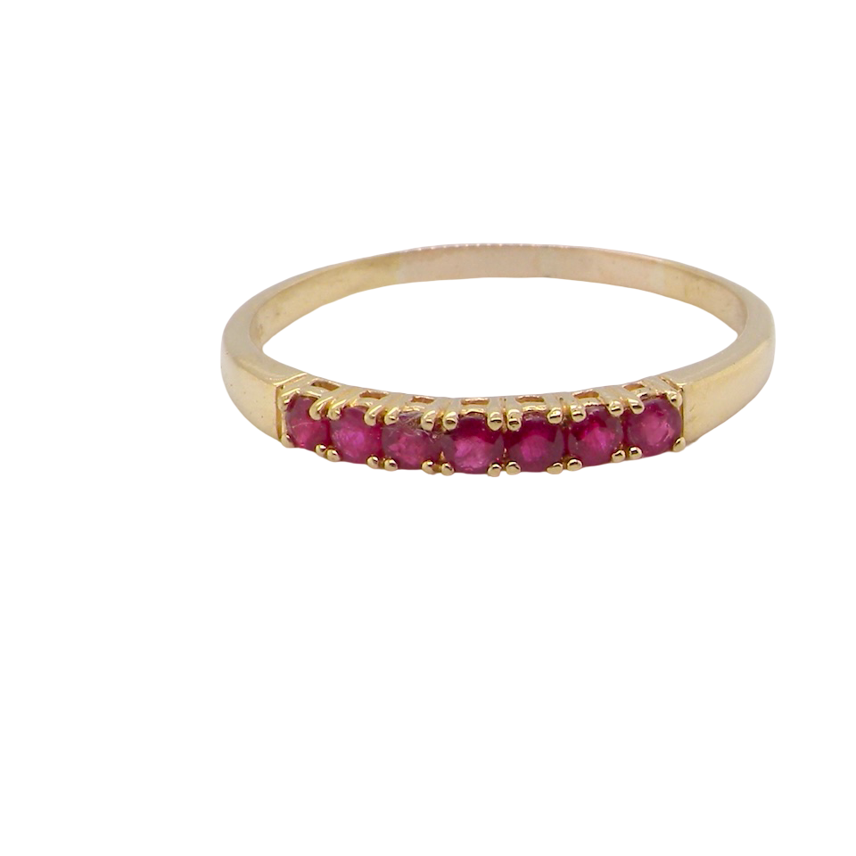 A half hoop ruby eternity ring