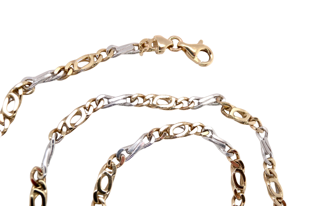 A heavy 9 carat gold neck chain. 2 colour gold, white and yellow