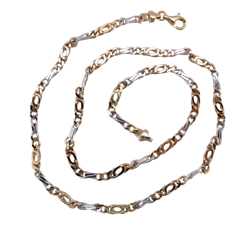 A heavy 9 carat gold neck chain. Two colour gold, white and yellow