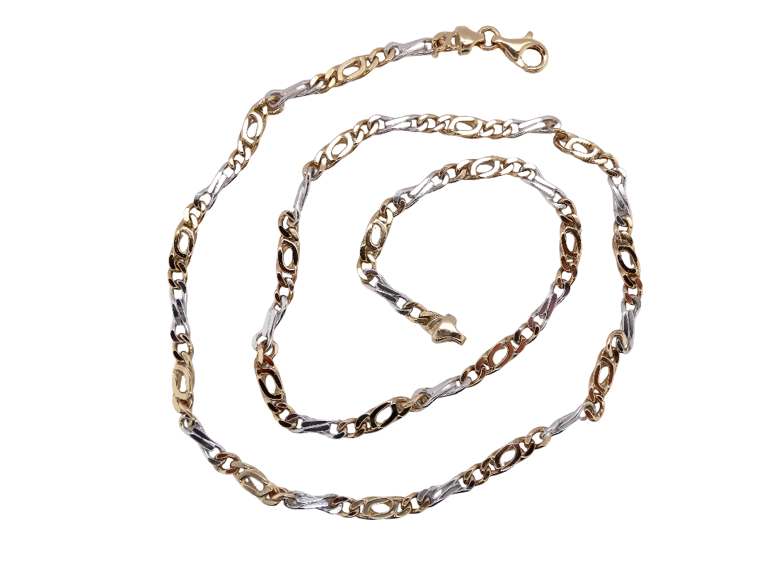 A heavy 9 carat gold neck chain. Two colour gold, white and yellow
