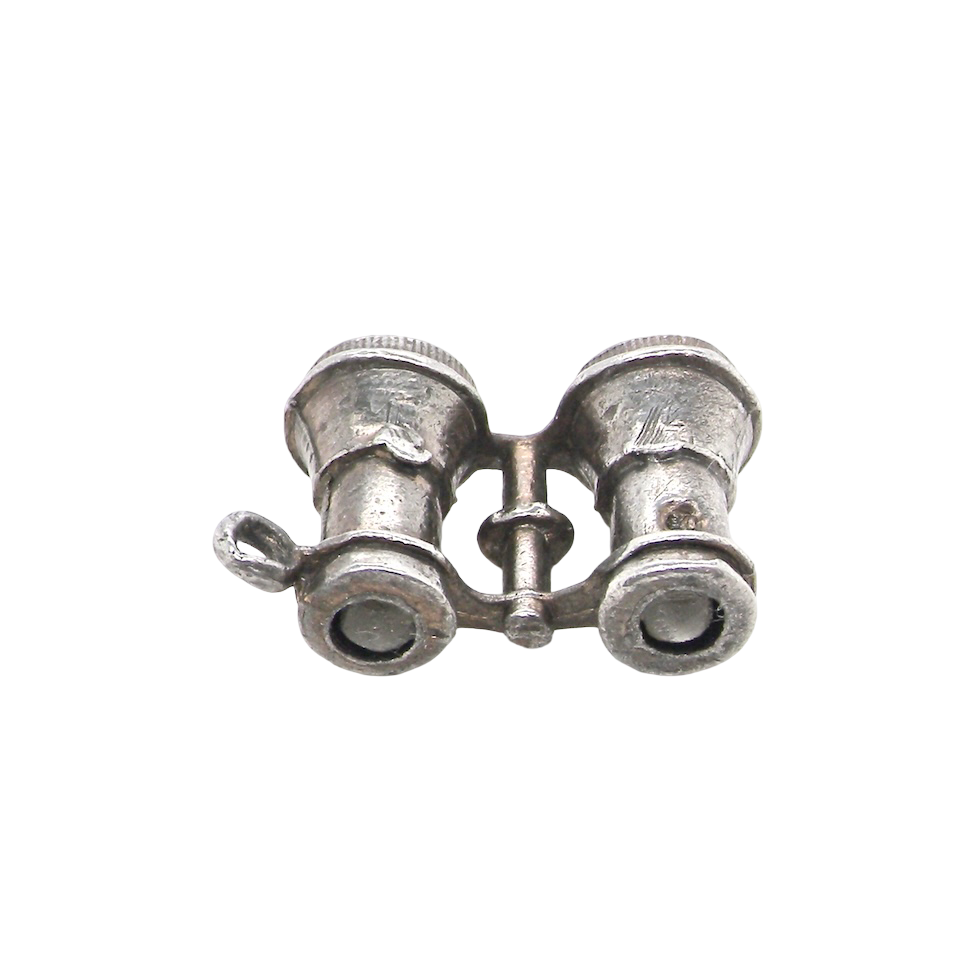 A highly unusual and collectable silver charm. Binoculars that show Edward VII and his wife Alexandra (daughter of Christian of Denmark) when viewed through the lens