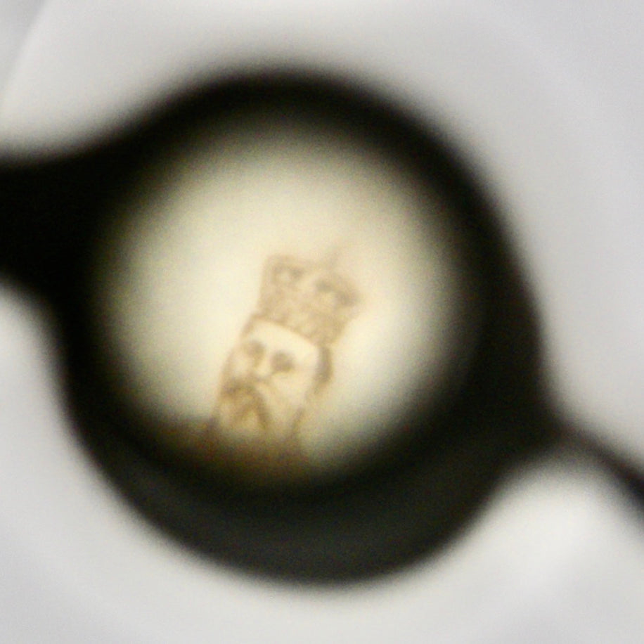 A highly unusual and collectable silver charm. Binoculars that show Edward VII and his wife Alexandra (daughter of Christian of Denmark) when viewed through the lens image 1