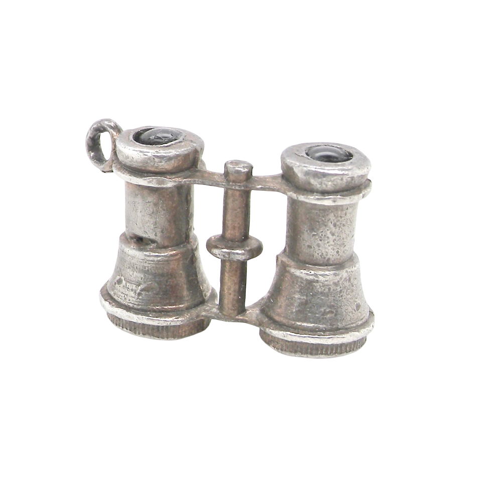 A highly unusual and collectable silver charm. Binoculars that show Edward VII and his wife Alexandra when viewed through the lens