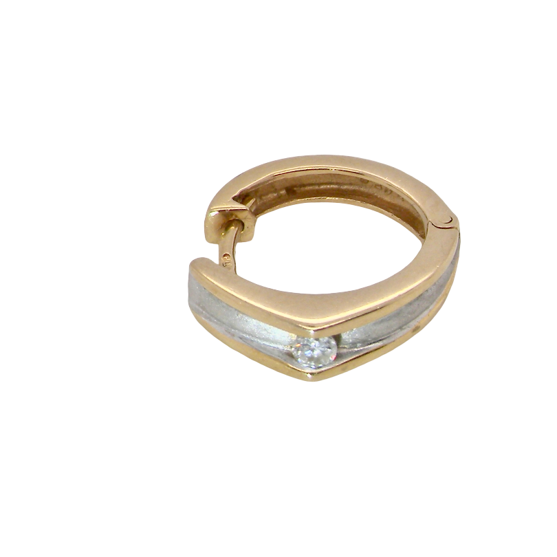 A small gold huggie hoop earring with a channel-set silver inlay and a single round clear gemstone at the front, shown on a plain white background.