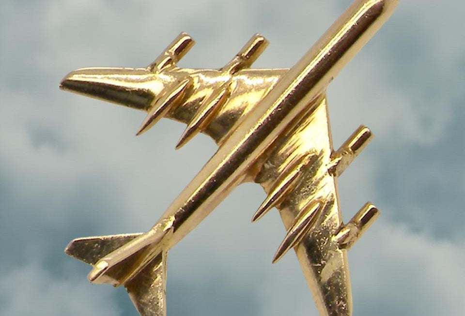 A jet aeroplane tie stud