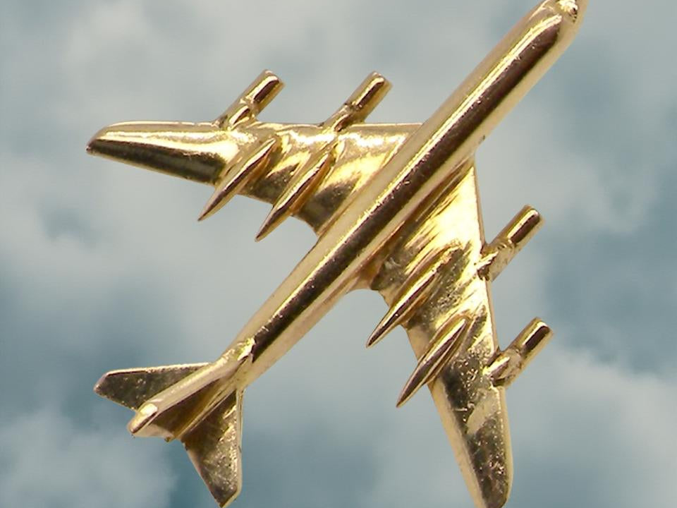 A jet aeroplane tie stud
