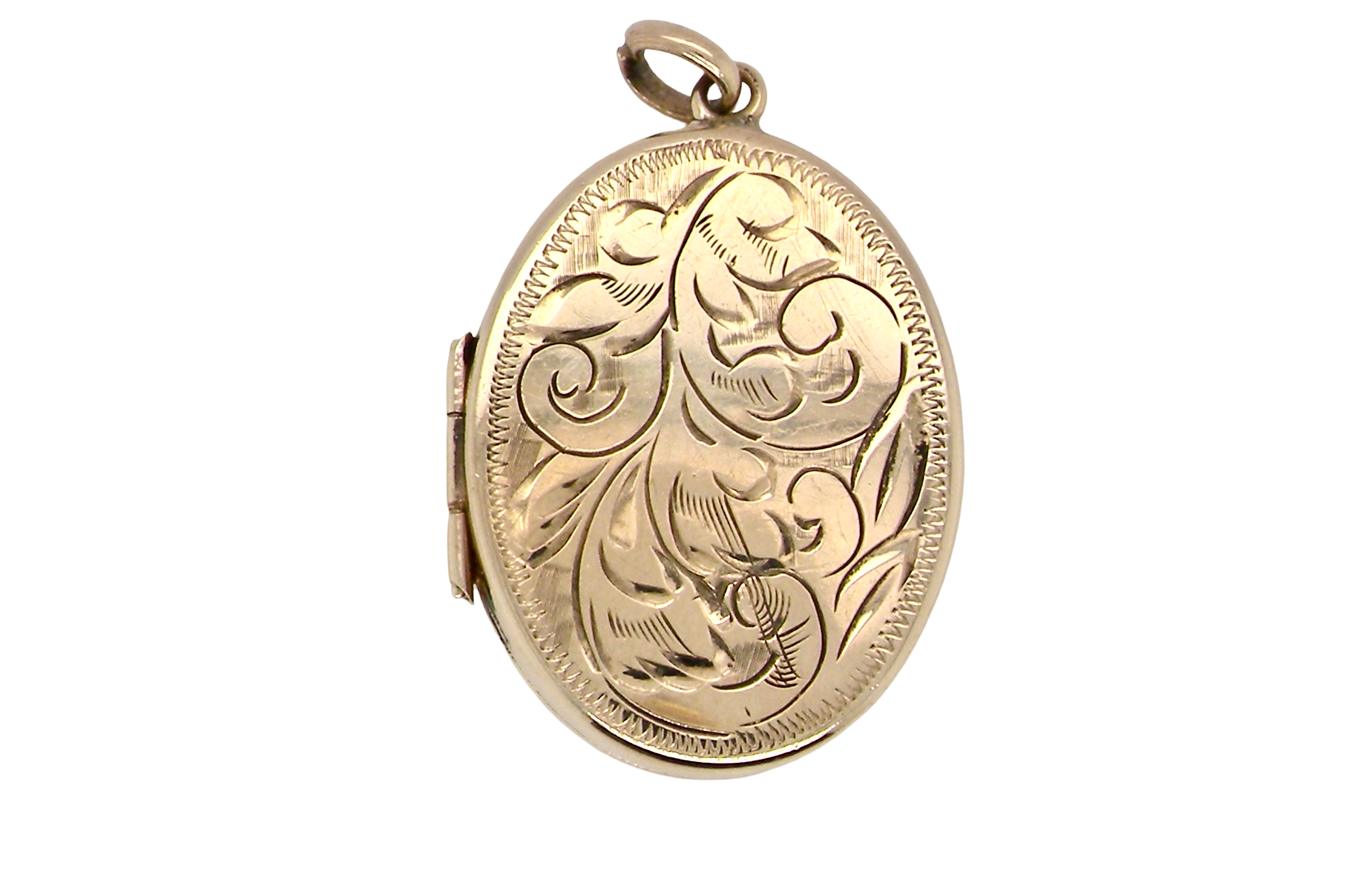 A large oval shaped locket. Measures 30x20mm. The front is hand engraved, .