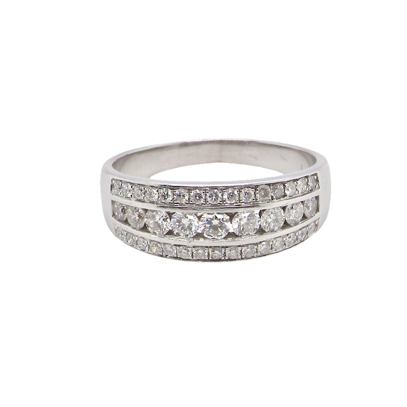 A lovely 18 carat white gold half hoop ring. Set with a middle row of nine bright white brilliant cut diamonds, graduate from 2.2mm to 2.6mm. The top and bottom rows are also set with small diamonds.