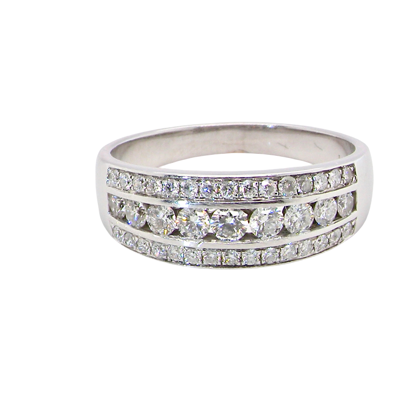A lovely 18 carat white gold half hoop ring. Set with a middle row of nine bright white brilliant cut diamonds, graduate from 2.2mm to 2.6mm. The top and bottom rows set with small diamonds.