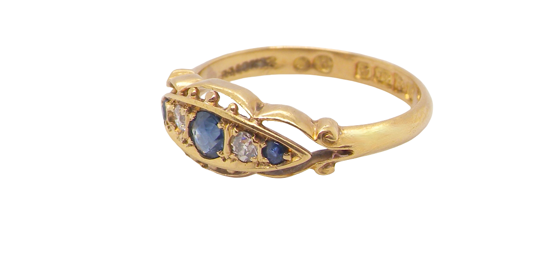 A lovely antique ring from the Edwardian period. Hallmarked in Chester in 1909 this ring typical for the period is set with sapphires and diamonds.
side