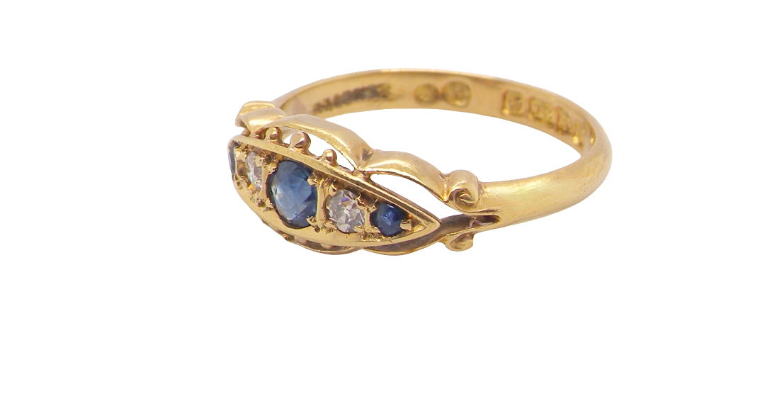 A lovely antique ring from the Edwardian period. Hallmarked in Chester in 1909 this ring typical for the period is set with sapphires and diamonds.
side
