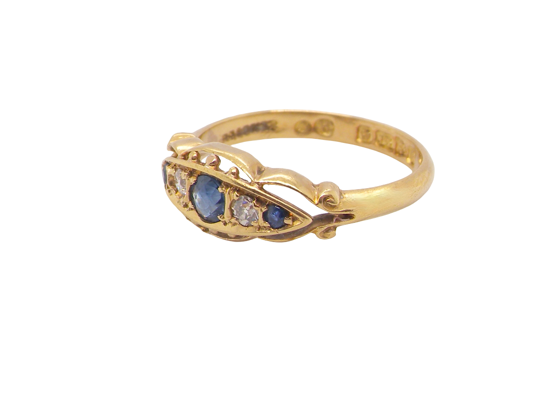 A lovely antique ring from the Edwardian period. Hallmarked in Chester in 1909 this ring typical for the period is set with sapphires and diamonds.
side