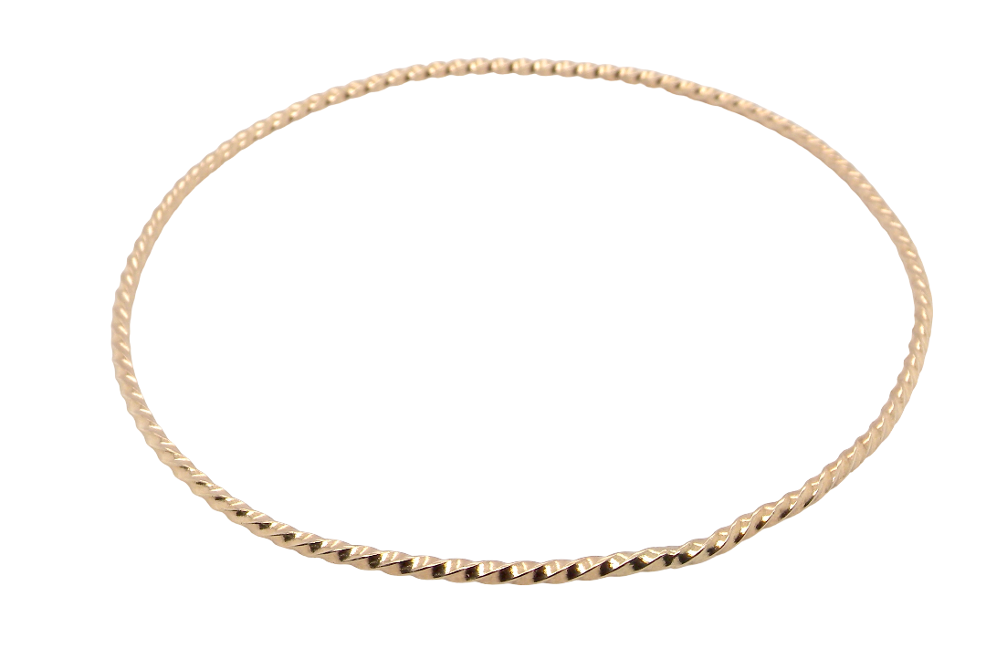 A lovely 9 carat gold wrist bangle . Barley twist design, solid not hollow, just