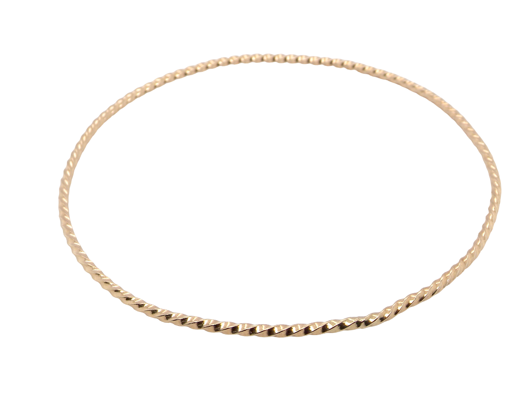 A lovely 9 carat gold wrist bangle . Barley twist design, solid not hollow, just