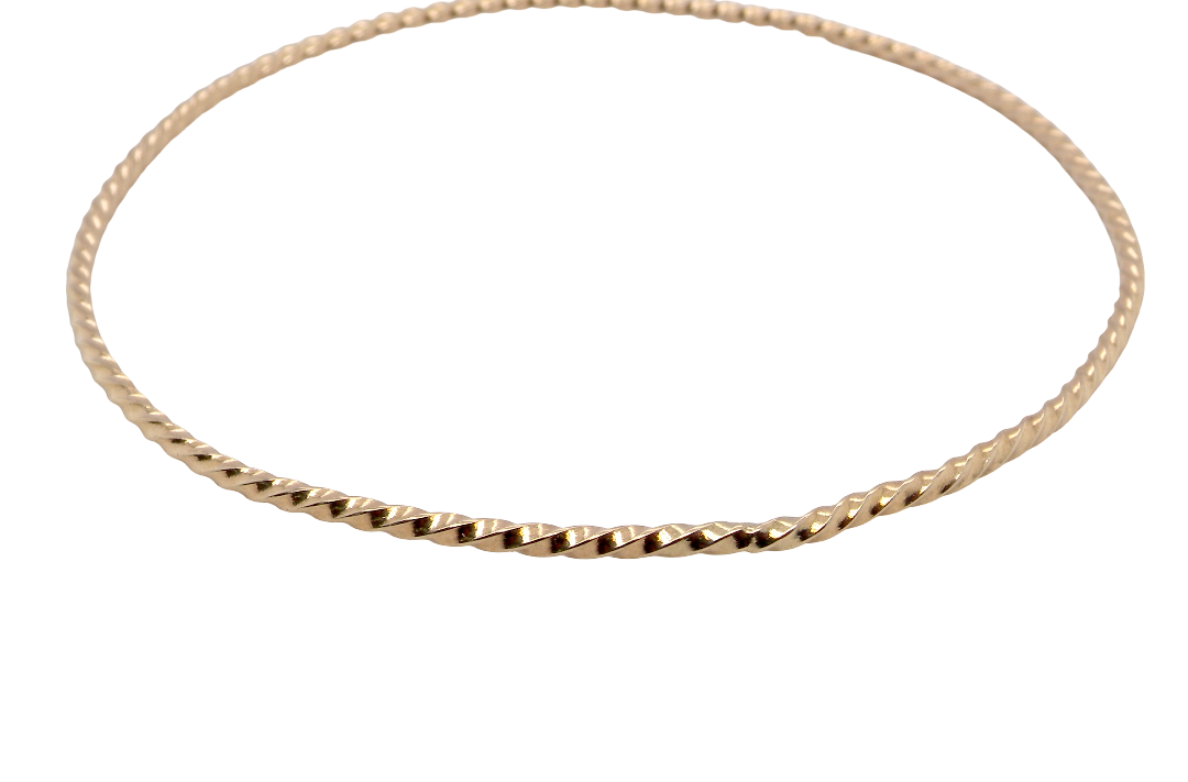 A lovely 9 carat gold wrist bangle . Barley twist design, solid not hollow, just under 2mm width.