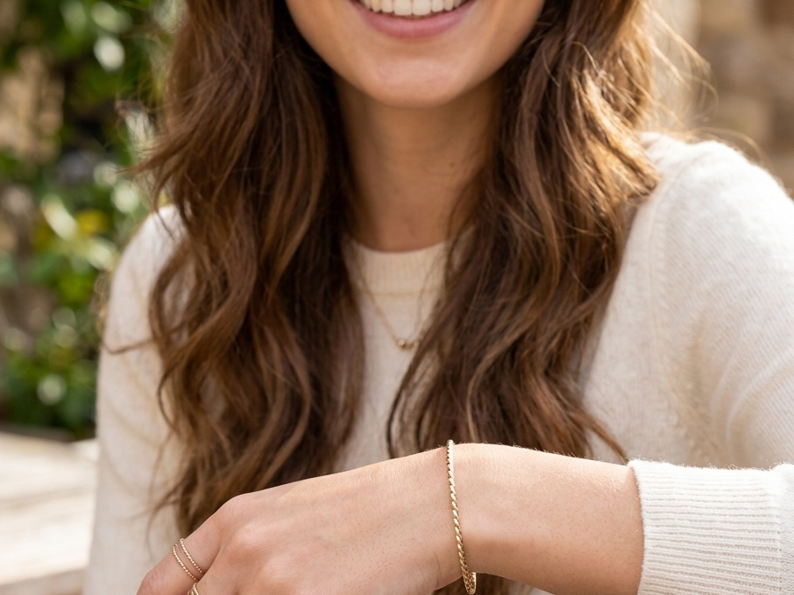 A lovely 9 carat gold wrist bangle . Barley twist design, solid not hollow, just under 2mm width.
model