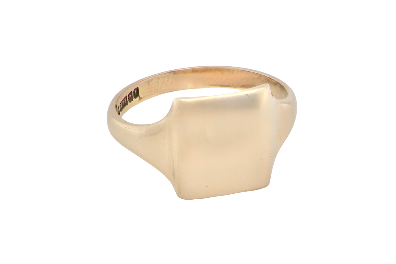 A man's plain gold signet ring rectangular