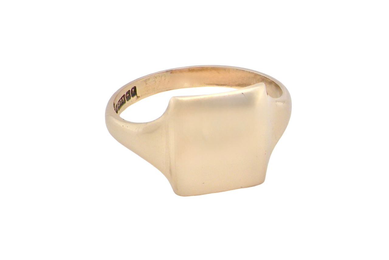 A man's plain gold signet ring rectangular