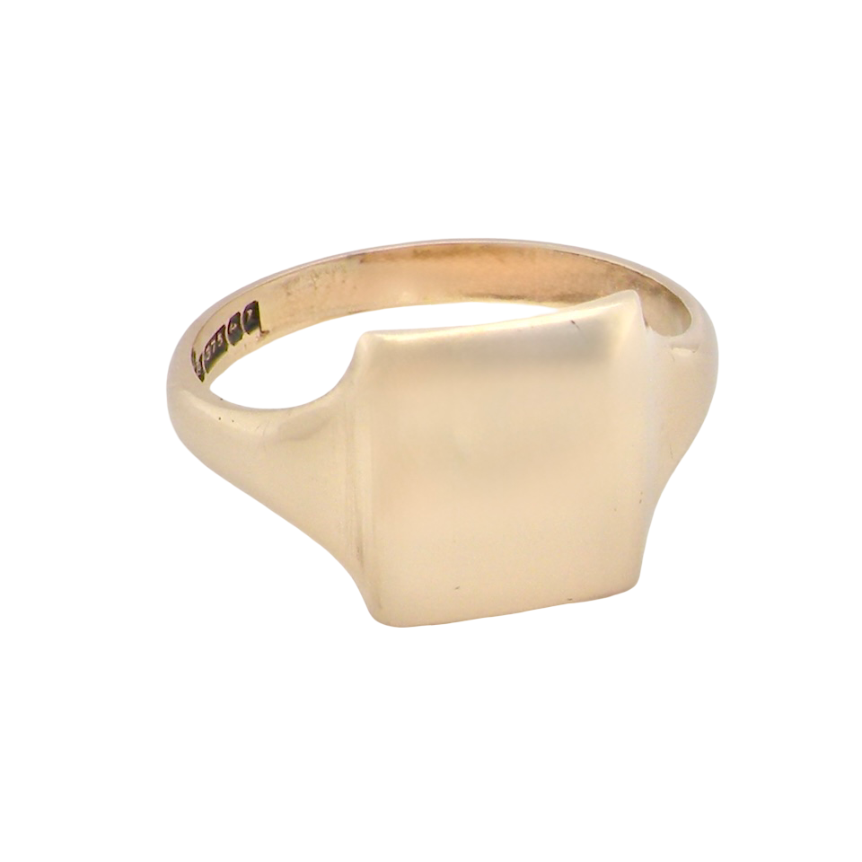 A man's plain gold signet ring rectangular