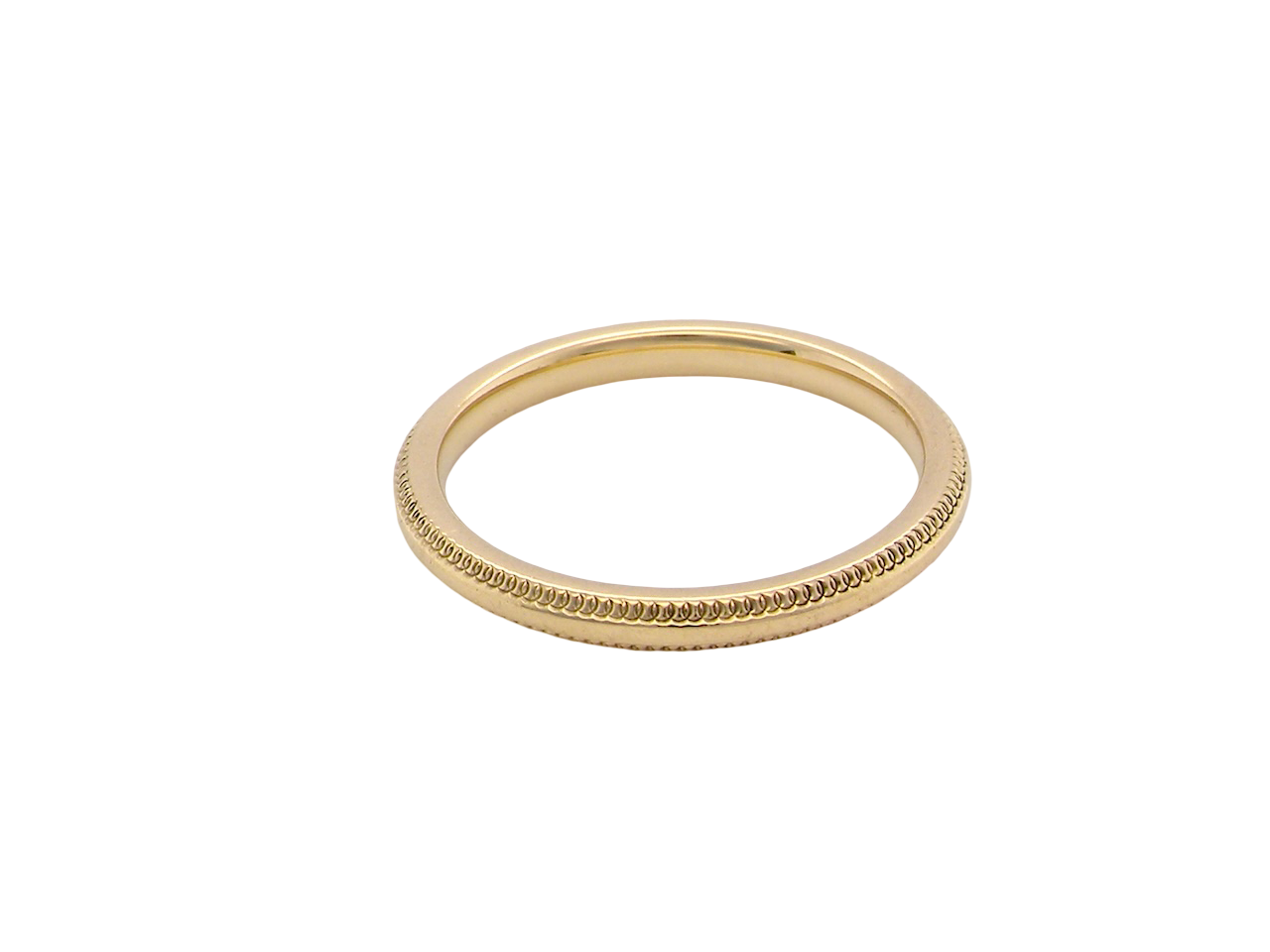 A narrow 18 carat gold wedding ring bead design