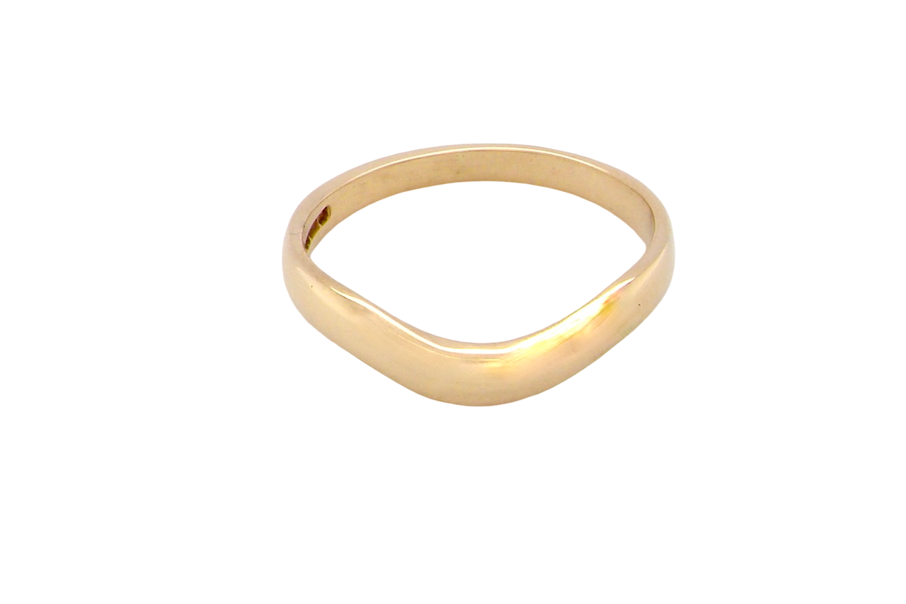A narrow 18 carat yellow gold wedding ring. This has a U shape which makes the placing of a cluster or even a solitaire engagement ring that much easier to place against as it will sit with the 'U'