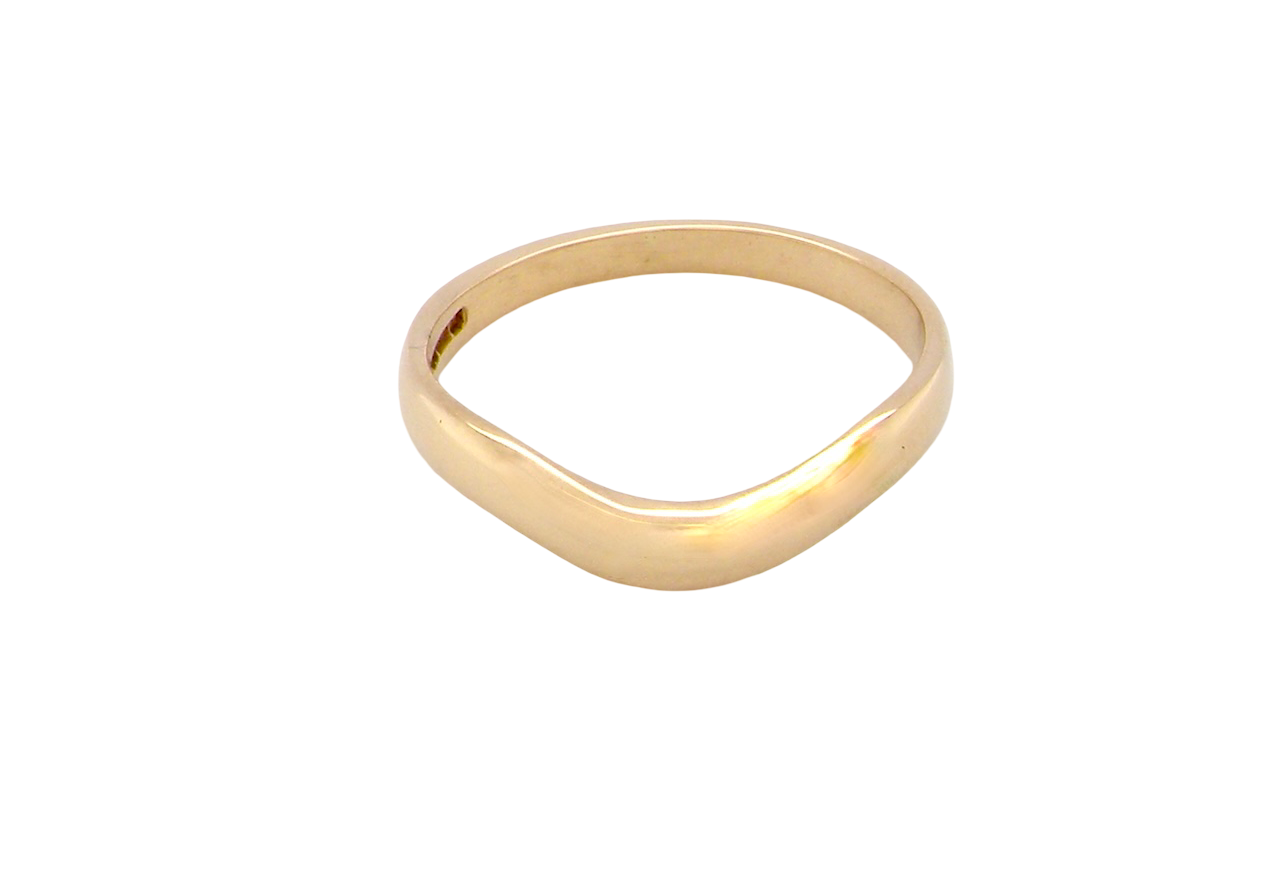 A narrow 18 carat yellow gold wedding ring. This has a U shape which makes the placing of a cluster or even a solitaire engagement ring that much easier to place against as it will sit with the 'U'