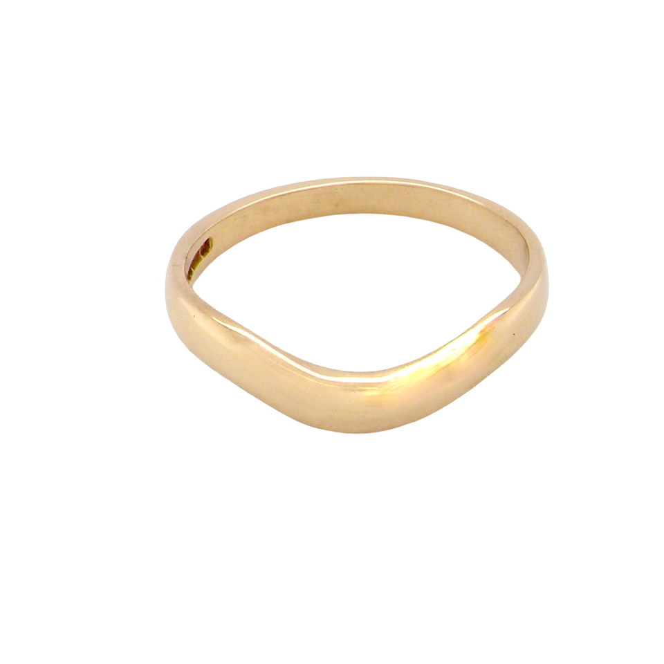 A narrow 18 carat yellow gold wedding ring. This has a U shape which makes the placing of a cluster or even a solitaire engagement ring that much easier to place against as it will sit with the 'U'