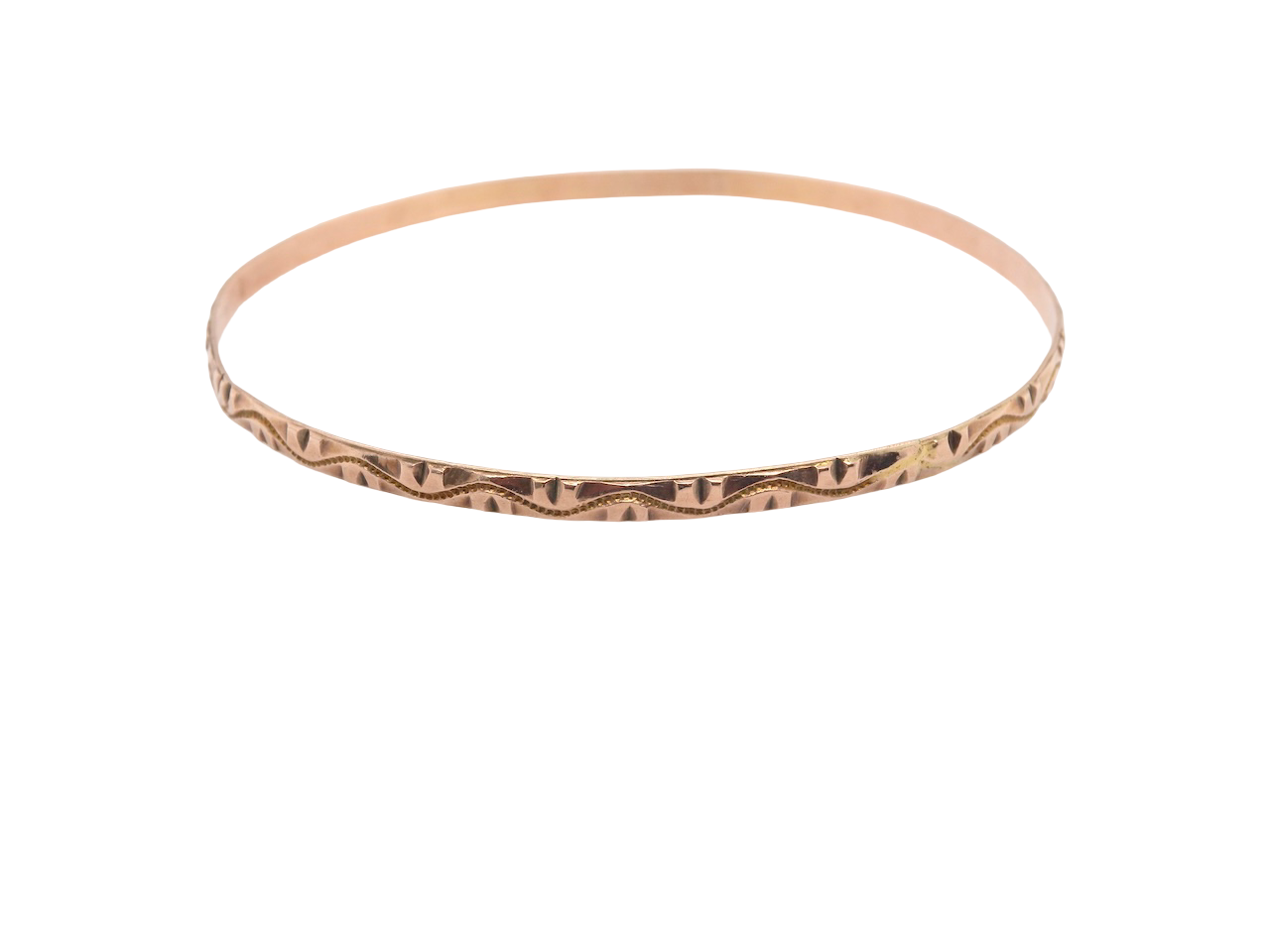 A narrow gold bangle