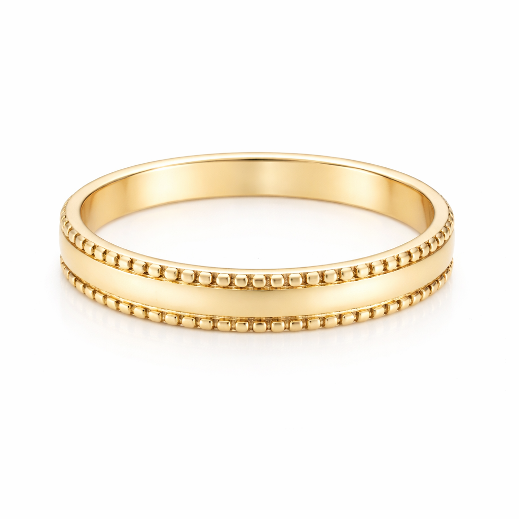 A narrow wedding ring, width 3.8mm, weight 2.3grams.
Beaded pattern