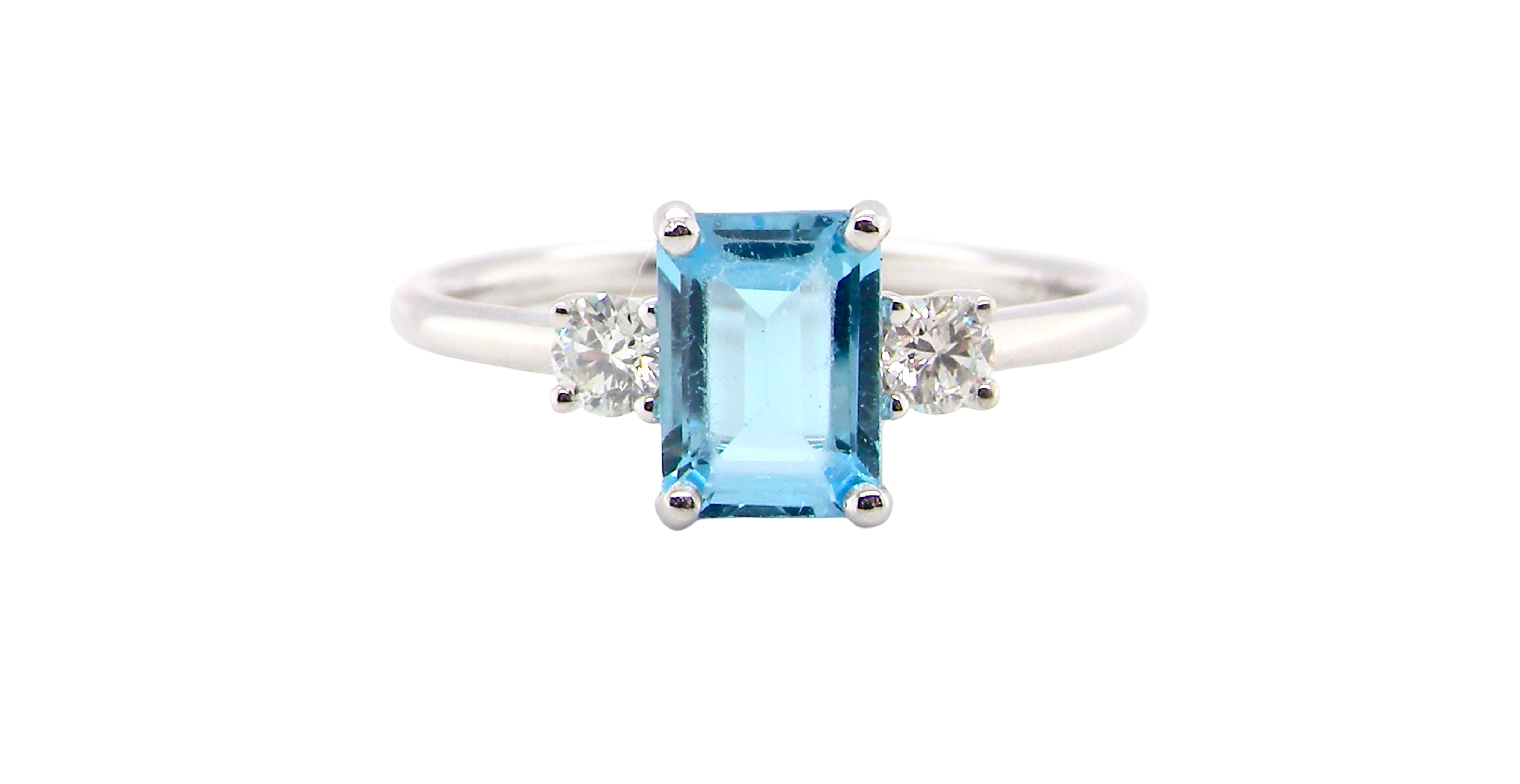 A 9 carat white gold three stone ring. This ring is from our Heirloom Collection. This is when we take a stone from a pre-owned ring that is worn out, and reset it into a brand new setting.