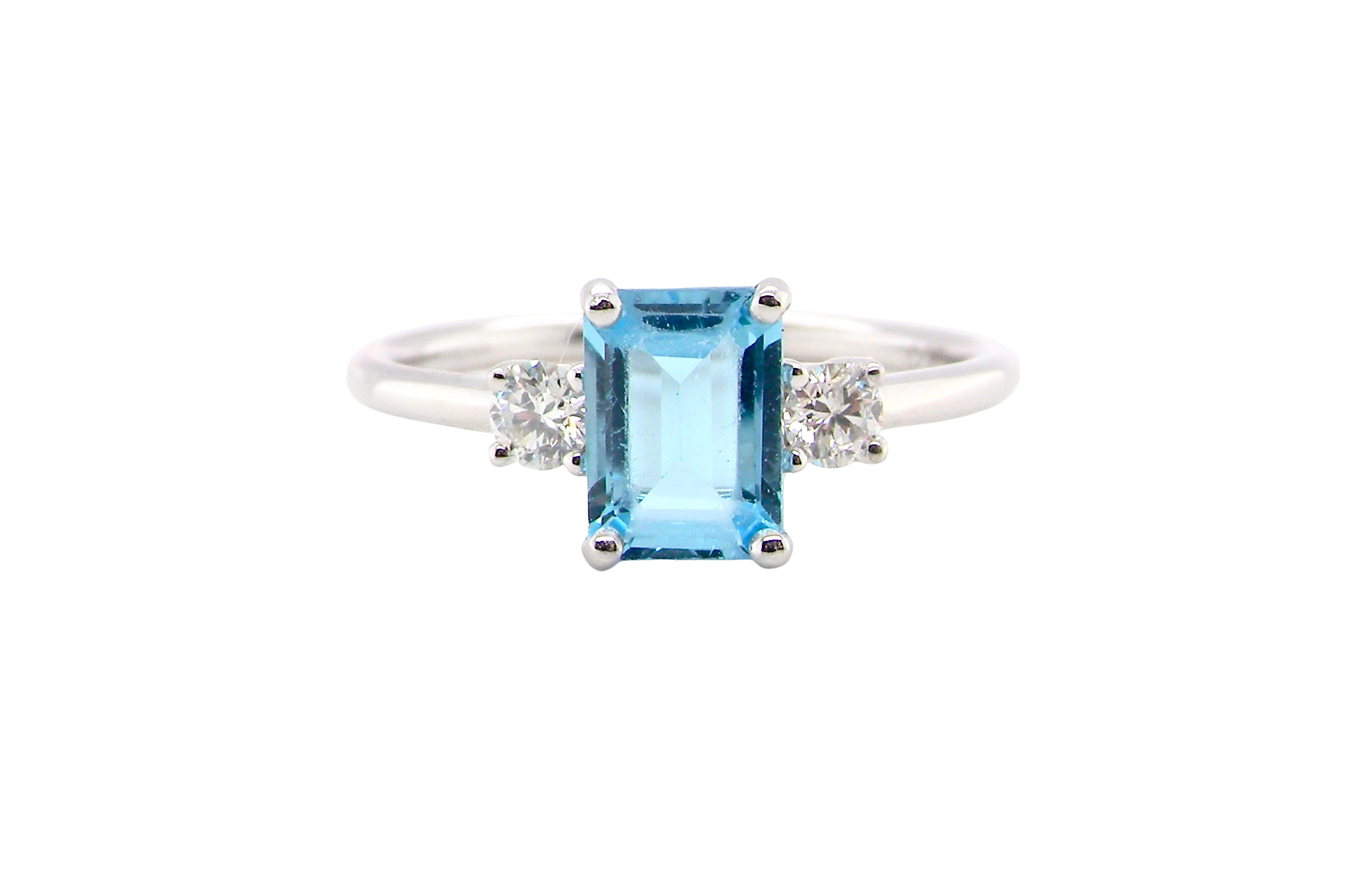 A 9 carat white gold three stone ring. This ring is from our Heirloom Collection. This is when we take a stone from a pre-owned ring that is worn out, and reset it into a brand new setting.
