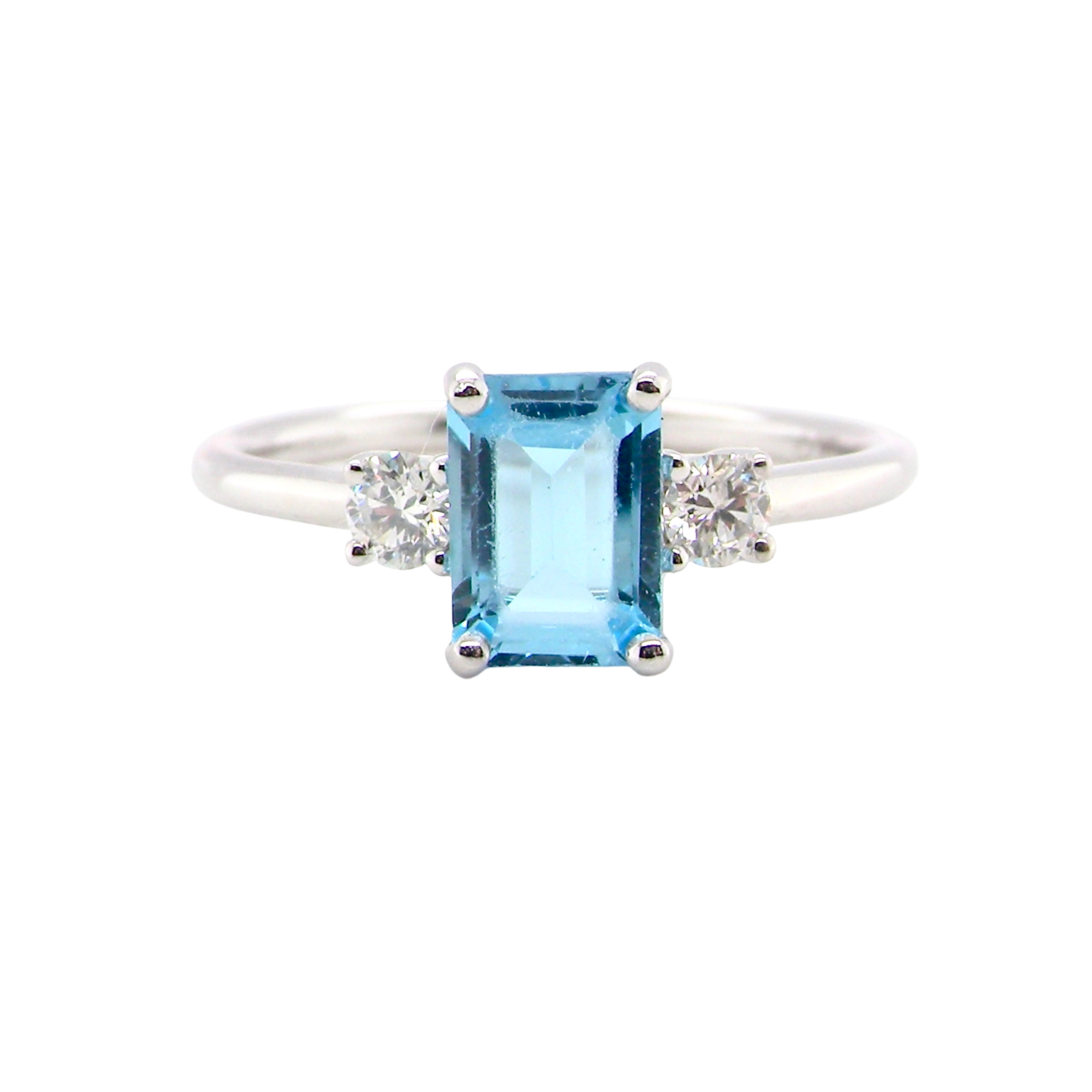 A 9 carat white gold three stone ring. This ring is from our Heirloom Collection. This is when we take a stone from a pre-owned ring that is worn out, and reset it into a brand new setting.