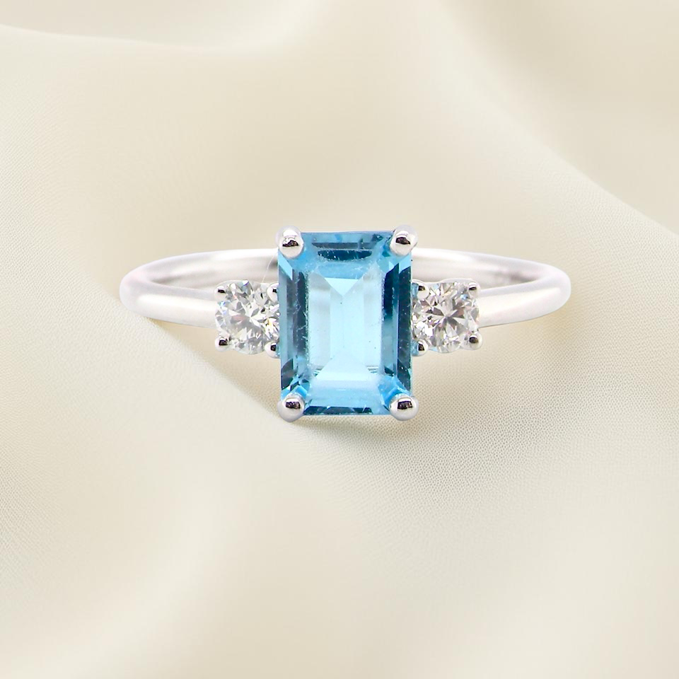 A 9 carat white gold three stone ring. This ring is from our Heirloom Collection. This is when we take a stone from a pre-owned ring that is worn out, and reset it into a new setting.