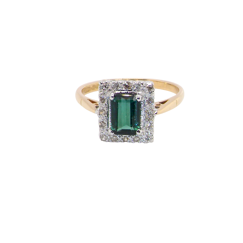 A near new cluster ring that shows no sign of wear, seems unworn.
Features a deep mint green tourmaline