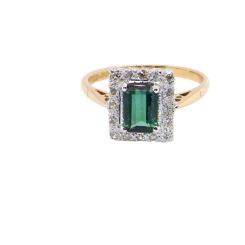 A near new cluster ring that shows no sign of wear, seems unworn.
Features a deep mint green tourmaline gemstone,