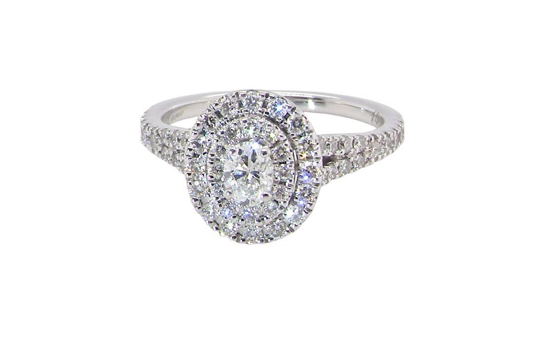A new diamond cluster ring* An oval diamond halo cluster ring. Set with brilliant cut white diamonds, colour H-k,